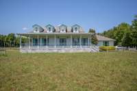 Front view of 2290 Osburn Rd, Arrington, with oversized garage and 4 gabled roof.