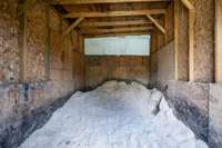 Shavings Shed for storage of shavings to go into the barn stalls.