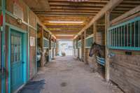 Looking into Barn. Tack/feed storage room on the left.