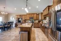 This picture shows how wonderfully open and bright this home is with beautiful cabinetry.