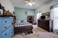 Carpeted 2nd Bedroom features an accent wall.