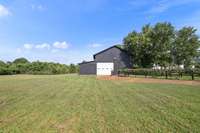 Large barn with 2 stalls, chicken coop and storage