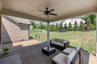 The Covered Porch offers a ceiling fan for comfort and has plenty of room for friends and family.