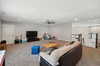 Other notable features include plush carpet, recessed lighting, ceiling fan, and attic access with loads of storage.