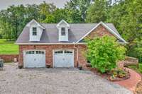 Apartment / office space is available in the 2 car garage. Enter through the garage, the side deck or the deck in the rear.