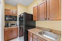 Kitchen downstairs in apartment / home office.