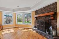 Large wood burning fireplace, and there are beautiful views through all the windows of the home.