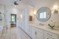 Primary bathroom with plenty of storage and upgraded features