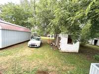 view of back yard that goes back to the alley