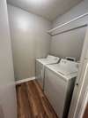 Laundry room with washer and dryer included