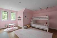 One of the bedrooms that shares a jack and jill bathroom.