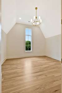 Middle Bedroom 4 Features a Dramatic Ceiling