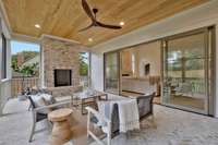 Outdoor Living at its Finest on the Elevated Screened Porch off the Great Room with Wood Burning Fireplace and Gas Starter