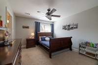 Upstairs bedroom with an attached Jack and Jill bathroom set up.