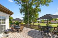 Expansive back deck with views of the #3 green and glimpses of Old Hickory Lake.