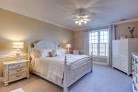 An additional over-sized master suite upstairs offers a private retreat for family or guests
