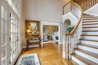 Magnificent 2-story entry foyer greets you with an impression of elegance with incredible natural light