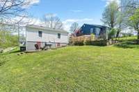 Plenty of backyard space! Storage area under left of house.