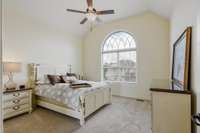 Bedroom 2 has high ceilings and natural light