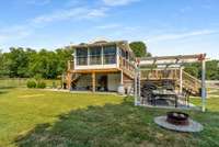 Pergola and dining area in the back yard make for great entertaining space