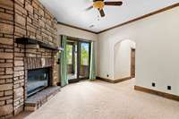 foyer sitting area leading into primary bedroom on first floor