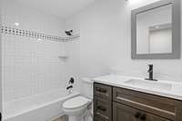 Bathroom 3 Custom tile shower and granite vanity, features wonderful lighting