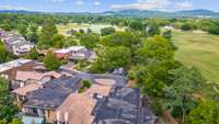 Drone view from the rear of the home overlooking the cul de sac