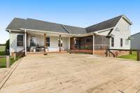 Step out onto the expansive deck and take in breathtaking views of the surrounding farmland. Break out the barbecue or slow dance under the stars. This outdoor space is perfect for entertaining, relaxing, or simply enjoying the beauty of nature.