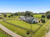 Admire expansive, lush pastures from the comfort of your home. This property’s wide-open space is an ideal setting for equestrian activities or simply enjoying the tranquility of rural living. With open land as far as the eye can see, this is a gem!