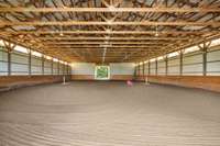 Train year-round in the spacious indoor riding arena, complete with ample lighting and a soft dirt surface. Whether rain or shine, this facility ensures that you and your horses can practice in comfort. A top-tier facility for serious equestrians.