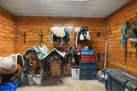 Step inside the tack room, where every detail has been considered. This organized space for all your equestrian essentials ensures each of your riding experiences are seamless. Designed with convenience in mind, it’s a rider’s dream.