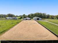 Enjoy riding in the expansive outdoor arena, featuring a well-maintained sand-over-clay surface. With ample space and powered lighting, it’s perfect for both casual riding, serious training, and an assortment of day or night-time events.