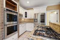 High end built in stainless appliances with included refrigerator.