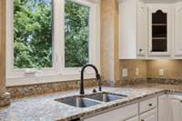 Kitchen overlooks the back of this estate.