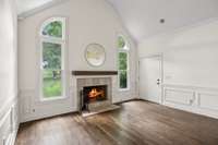 Flex space offers fireplace and side entry.