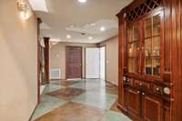 Floor to ceiling humidor with built in wine storage.