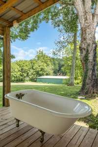 THE ULTIMATTE IN PRIVACY.... Home sits way off the Road Clawfoot Tub on the Back Porch Does not convey...