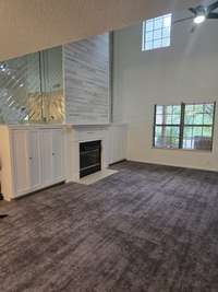 Most stunning  living room with 30 foot ceilings new ceiling fan installed