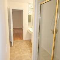 Primary bedroom bath with walk in shower and separate tub