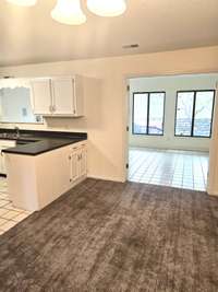 Dining Area to the Sunroom- Dining area is open and airy