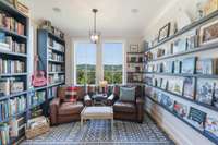 A perfect spot for reading or home office on the main floor with vista views