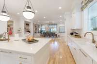 Double sinks and double dishwashers. Don't forget the double pull-out trash cans