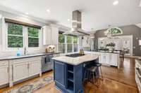 Kitchen, opens seamlessly to a welcoming outdoor lanai.