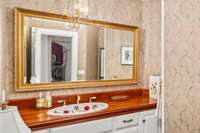 There's a definite nature-theme throughout the entire home, evidenced by this amazing sink in the powder room!