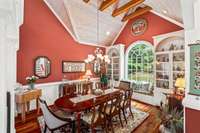 The beautiful window is flanked by display cabinets, another architectural detail in this home.