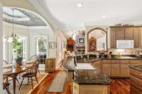 The breakfast nook faces the back of the home.