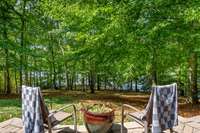 And you are that much closer to the water! The treed back yard is fully fenced.