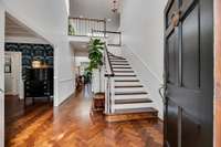 2 story foyer offers abundant natural light from the skylights above