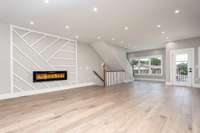 View of spacious, combination Living room and Kitchen with outdoor balcony.