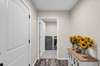 FOYER GARAGE ENTRANCE AND LAUNDRY ROOM